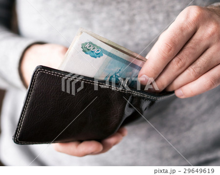 Hands take out russian rubles from wallet 29649619