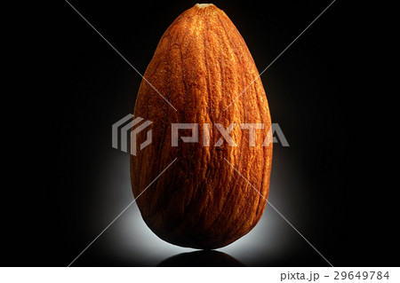 Almond on black background. Close-up or macro 29649784