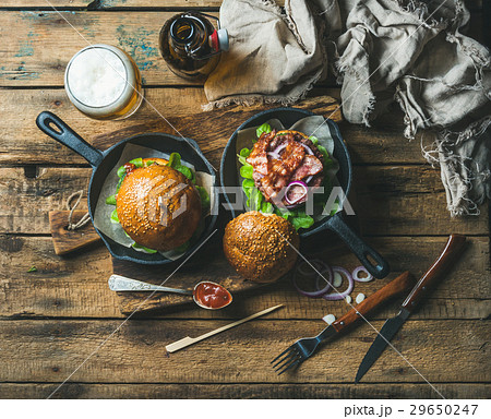 Homemade beef burgers with crispy bacon and wheat 29650247
