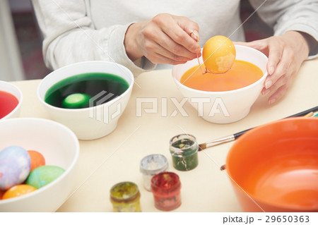 Woman preparing Easter eggs Woman preparing Easter eggs 29650363
