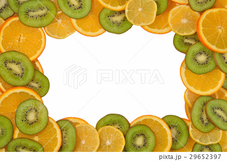 Frame of orange, lemon and kiwi slices on a white Frame of orange, lemon and kiwi slices on a white 29652397