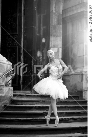 Young ballerina woman posing on stairs Young ballerina woman posing on stairs 29653697