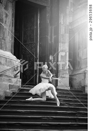 Young ballerina woman posing on stairs Young ballerina woman posing on stairs 29653698
