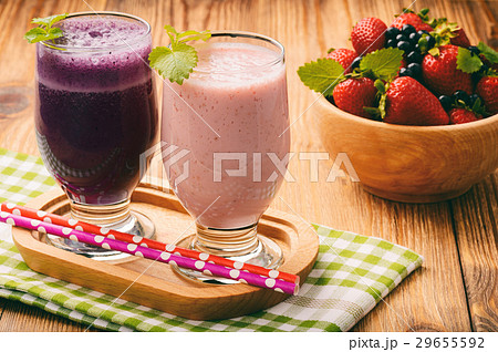 Healthy tasty milk cocktails with berries 29655592