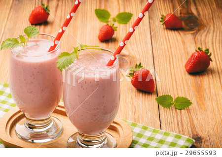 Healthy tasty milk cocktails with strawberries. Healthy tasty milk cocktails with strawberries. 29655593