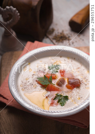 Vichyssoise soup in the ceramic plate vertical 29655751