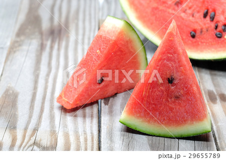 Watermelon slice on wooden. Watermelon slice on wooden. 29655789
