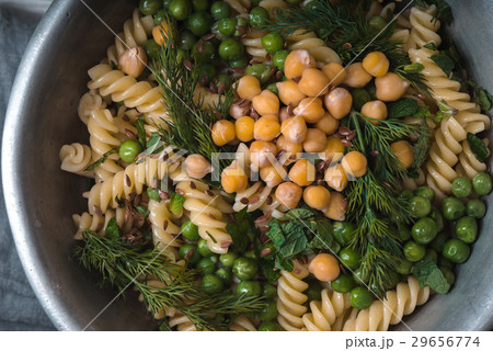 Vegetarian pasta with peas and mint  in the bowl 29656774