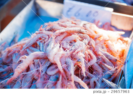 Box full of red shrimp.  29657963