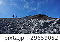 Two mountaineers hike on their way to the peak 29659052