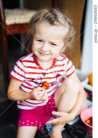 Beautiful girl squinting from the sun Beautiful girl squinting from the sun 29660085