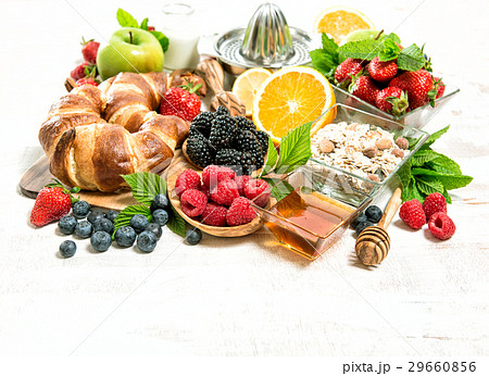 Breakfast with croissants, muesli, fresh berries 29660856