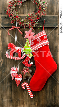 Christmas stocking and handmade toys hanging. 29661088