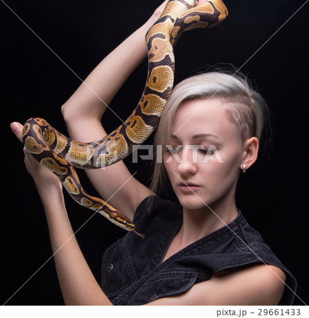 Blond woman with snake 29661433
