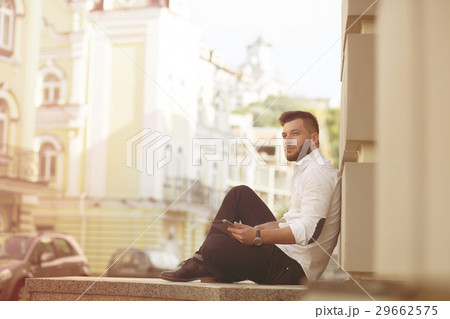 Businessman sit outdoor 29662575