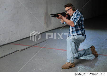 Brutal handsome man looking at his target Brutal handsome man looking at his target 29664949