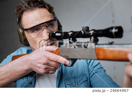Skilled professional marksman having target 29664967