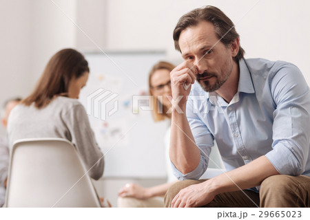 Attentive man looking straight at camera Attentive man looking straight at camera 29665023