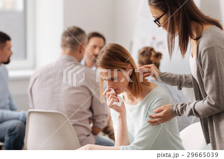 Thoughtful young blonde sitting alone Thoughtful young blonde sitting alone 29665039