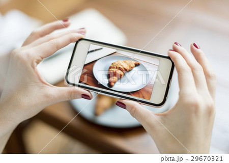 Woman Photographer Food Croissant Photography Concept 29670321