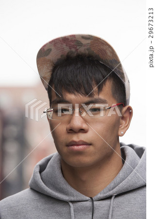 Portrait of pedestrian in city 29673213