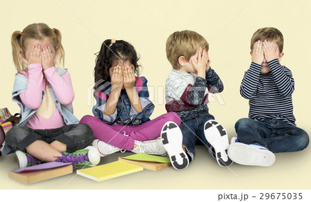 Little Children Peek-A-Boo Covering Face Little Children Peek-A-Boo Covering Face 29675035