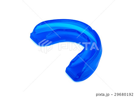 Blue mouthguard isolated on a white background. 29680192