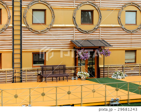 Fragment the facade of old house in orange style Fragment the facade of old house in orange style 29681243