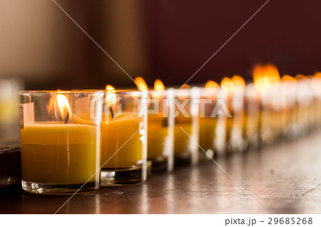 burning candel in glass for praying 29685268