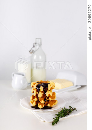 Fresh Belgian waffles with chocolate white wooden Fresh Belgian waffles with chocolate white wooden 29692270