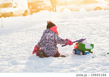 Kid play on the snow Kid play on the snow 29693188