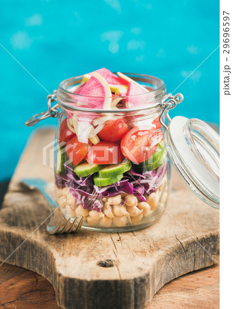 Vegetable and chickpea sprout vegan salad in jar Vegetable and chickpea sprout vegan salad in jar 29696597