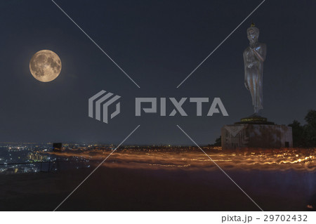 Big buddha on the mountain with full moon Big buddha on the mountain with full moon 29702432