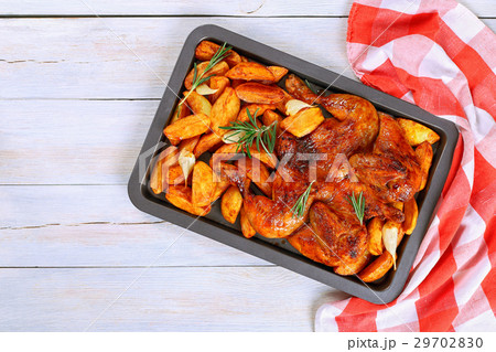 char-grilled a whole chicken with potatoes 29702830