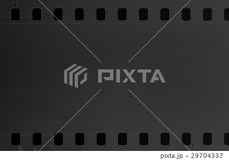 Old celluloid film with dust and scratches Old celluloid film with dust and scratches 29704337