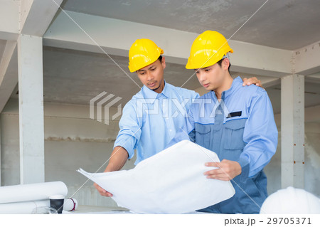Asian Civil engineer and Asian foreman working  29705371