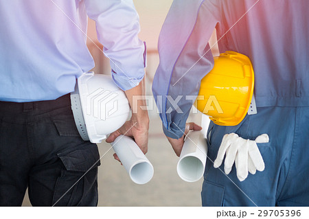 Asian Civil engineer and Asian foreman working Asian Civil engineer and Asian foreman working 29705396