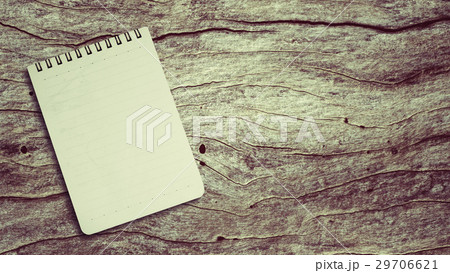Notebook on a wooden table Notebook on a wooden table 29706621