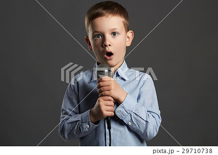 little boy with microphone.child singing karaoke little boy with microphone.child singing karaoke 29710738