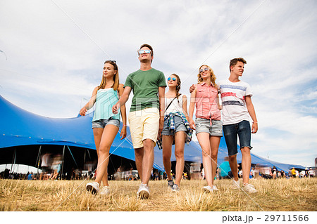 Teenagers at summer music festival in front of big Teenagers at summer music festival in front of big 29711566