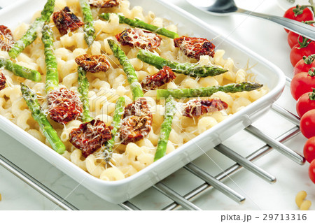 pasta with dried tomatoes, asparagus and pecorino pasta with dried tomatoes, asparagus and pecorino 29713316