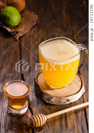 Brandy with orange juice, amaretto with a lime and 29713596