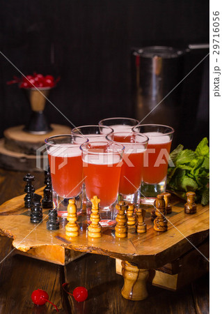 Singapore shot a set with gin and cherry brandy Singapore shot a set with gin and cherry brandy 29716056