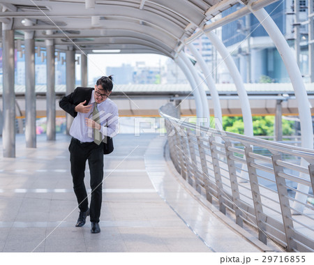 business manrush to work late.hurry and running 29716855