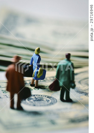miniature travelers on dollar banknotes miniature travelers on dollar banknotes 29716946