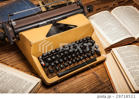 old typewriter, a pile of books old typewriter, a pile of books 29718511