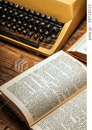 old typewriter, a pile of books old typewriter, a pile of books 29718513