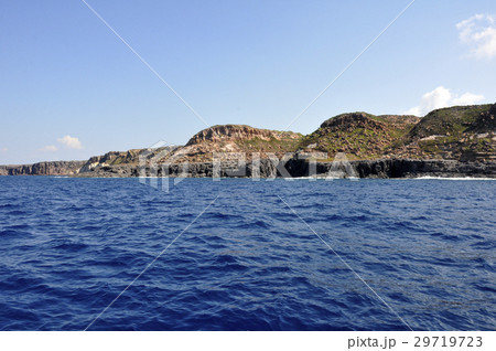 Blue sea and characteristic caves of Cala Luna Blue sea and characteristic caves of Cala Luna 29719723