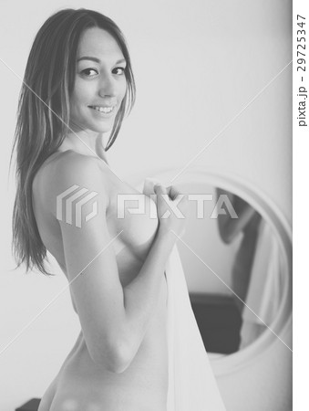 nude woman with mirror in bedroom nude woman with mirror in bedroom 29725347