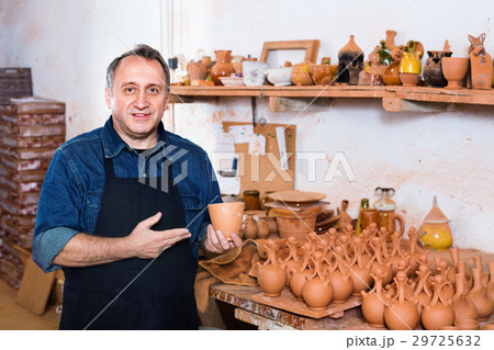 Happy potter at the workshop 29725632